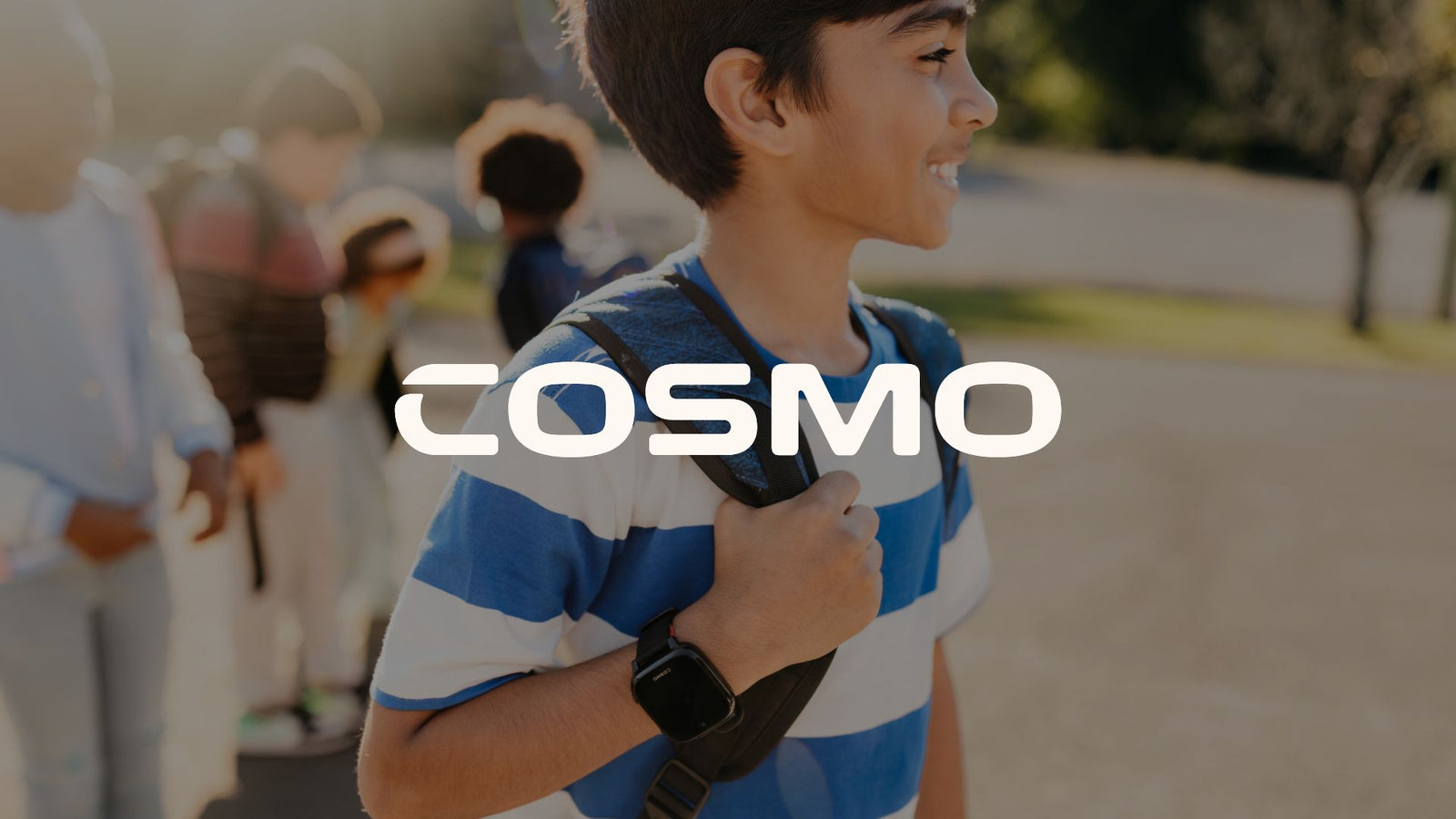 Child wearing SOS tracker watch outdoors in Scandinavian climate