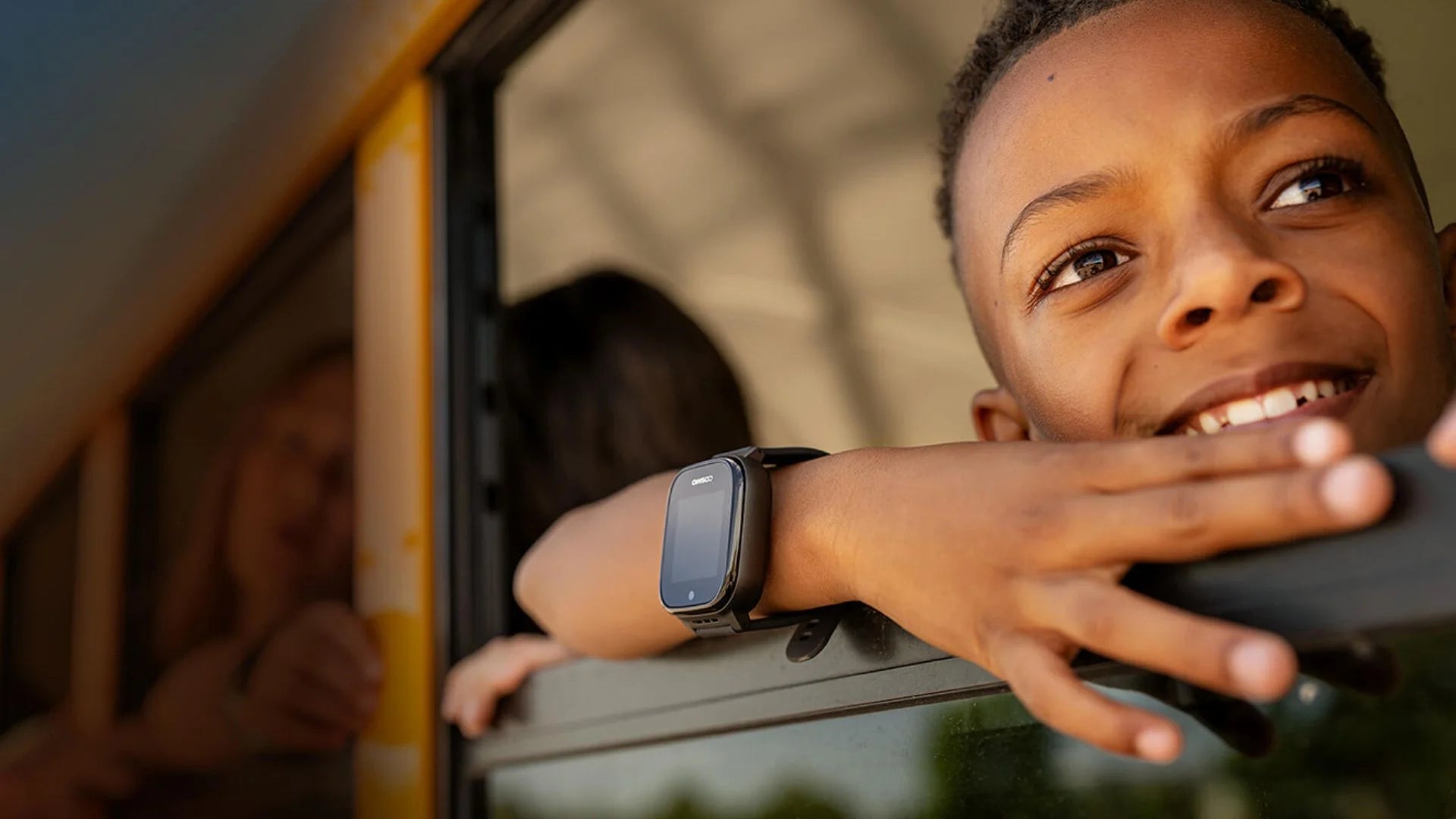 Child in urban Osaka transit hub using GPS smartwatch